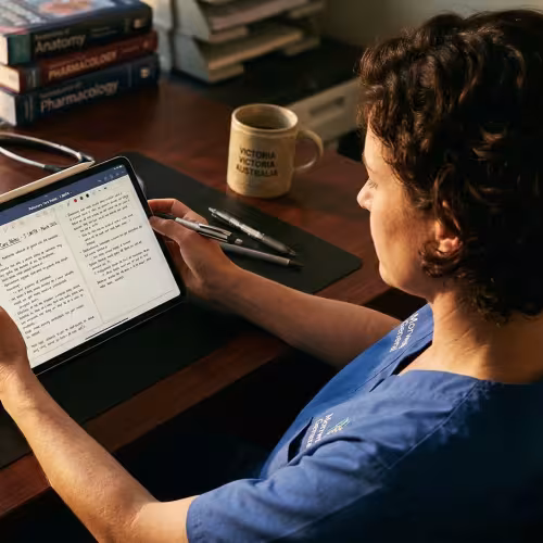 Person reading article on handheld device